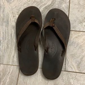Dark brown, thin strapped Rainbow flip flops